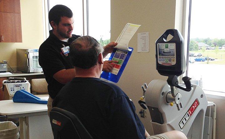 Tyler Shaffer '16 with cardiac rehab patient